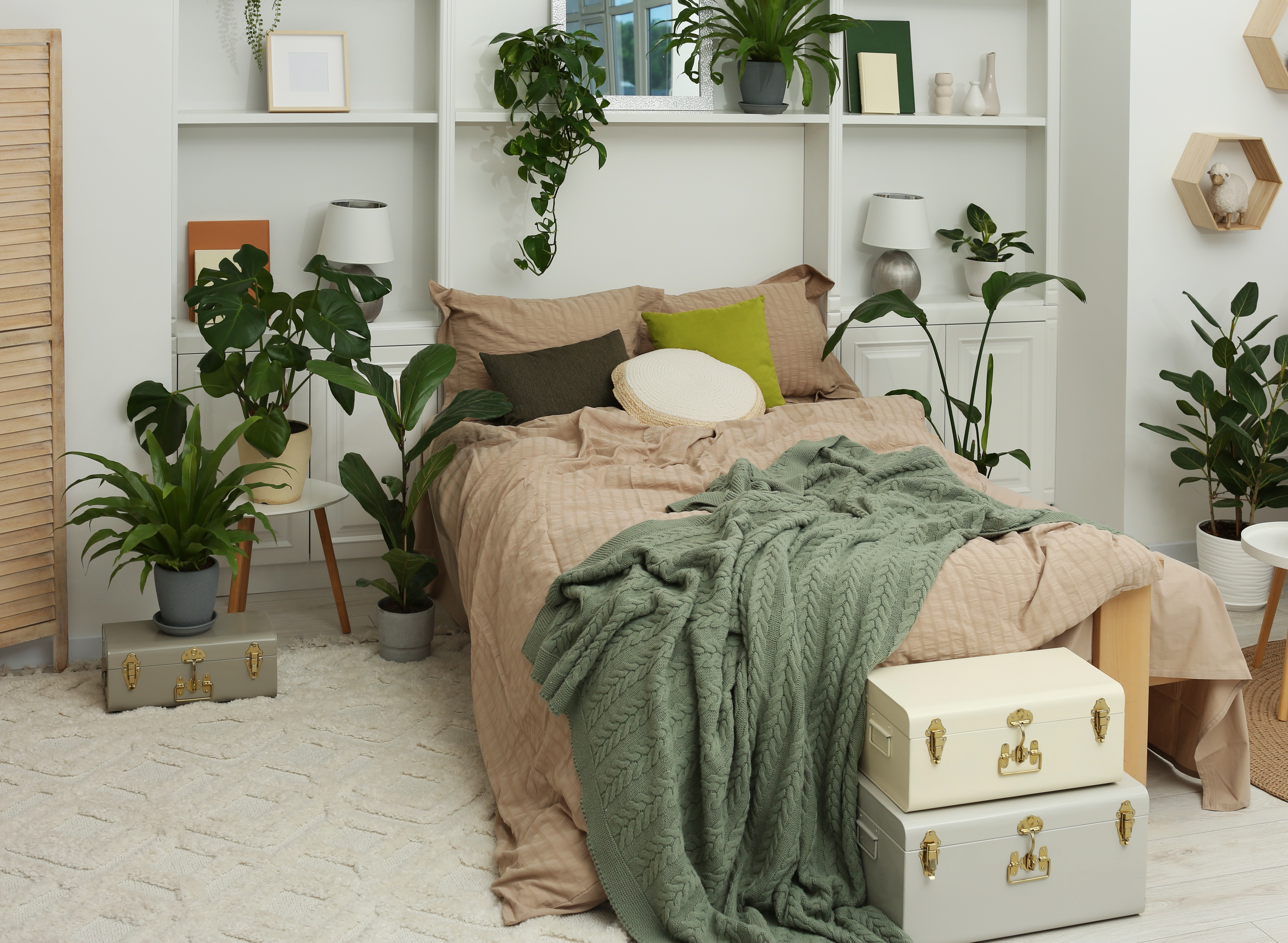 Bed with plants surrounding it